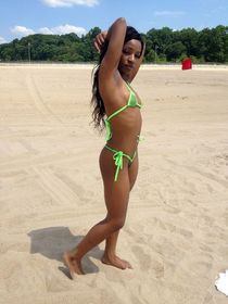 Ethnic girl posing naked